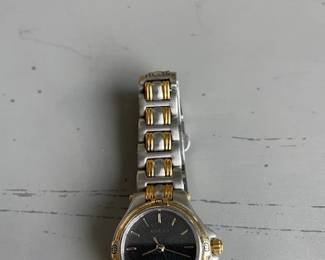 Vintage Gucci Ladie's Onyx Graphite. Date dial, Swiss Quartz, Stainless and Goldtone.