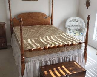 Queen bed with birds eye headboard.