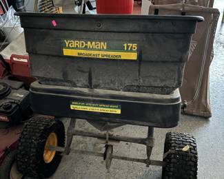 Pull behind spreader