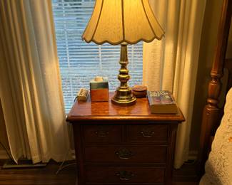 Night stand and brass lamp