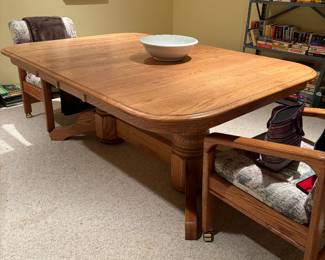 Oak dining table with two leaves