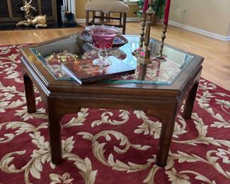 Glass and wood coffee table. Beautiful large wool rug