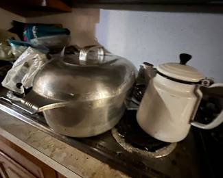 Pair of Amazing aluminum Wagner Dutch ovens… more pics ahead 