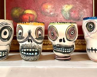Micheal Corny signed pottery skull cups