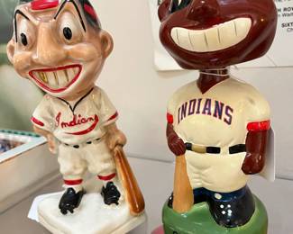 2 pretty rare figures -- one stationery and the other is a bobble