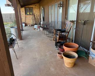 Yard tools, rock and sand dollar collection, yard furniture, 4 bird baths and much more!
