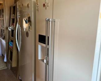 Side by side Refrigerator and Upright Freezer plus an additional side by side refrigerator and freezer in the garage.