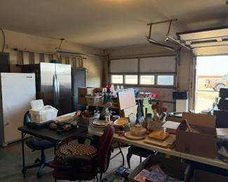 Upright freezer and side-by-side refrigerator/freezer.