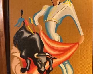 Matador and bull on  burlap 