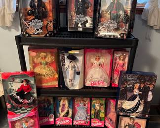 Hundreds of Barbies. New in box 