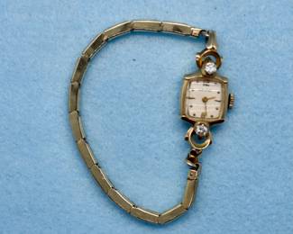14K and diamond watch