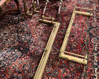 Brass fireplace fenders and andirons