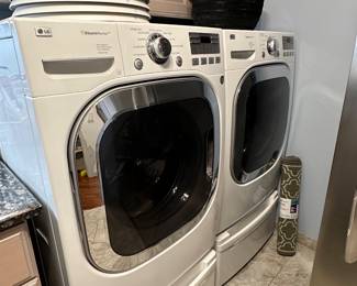 LG Steam Washer and Dryer with pedestals