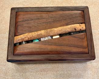 Heavily inlaid wooden box 