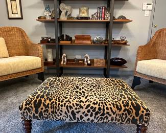 Large leopard fabric upholstered ottoman with casters