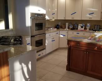 Kitchen cabinetry by Goebel Cabinetry. Large U-shaped kitchen 