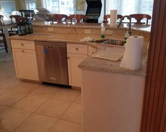 Kitchen cabinetry by Goebel Cabinetry. Large U-shaped kitchen 