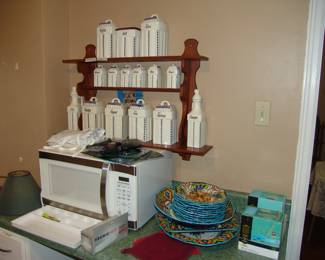 Antique spice containers with original shelf and microwave
