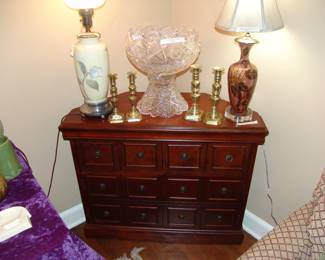 TV corner cabinet with 2 Rookwood lamps and cut glass punch bowl