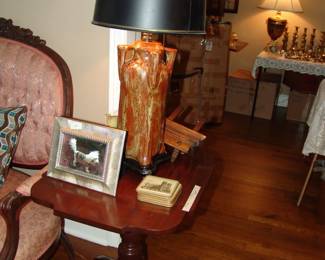Rookwood lamp on walnut table