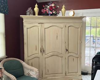 Large entertainment center.  weathered oak finish