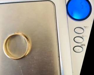 14k gold band weighs 5.7 grams 