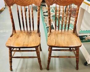 Solid Oak Ornate Pressed back spindle back chairs with solid bottoms 