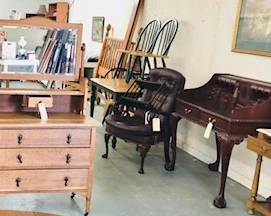 Assortment of fine quality estate Furniture . Antique Oak dresser with mirror, carved mahogany claw feet desk, contemporary table & 4 chairs, leather chair with queen Anne feet 