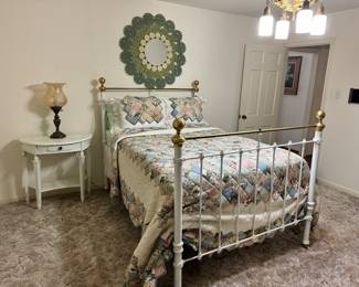 Iron full-size bed. Gorgeous quilt