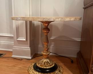 accent table.  capiz shell top w/ brass bottom.  24 x20.5  $700