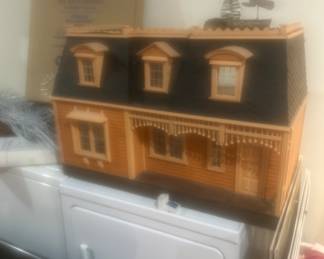 Victorian Dollhouse with furniture.