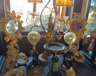 Mirrors and lamps and candlesticks