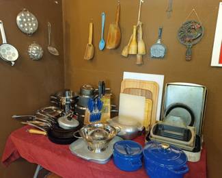 Vintage and modern pots and pans and cutting boards