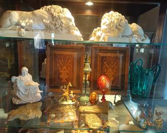 Carved lions, inlaid wood and embroidery pieces