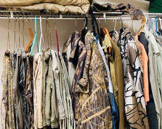 lots of hunting jackets, pants and gear