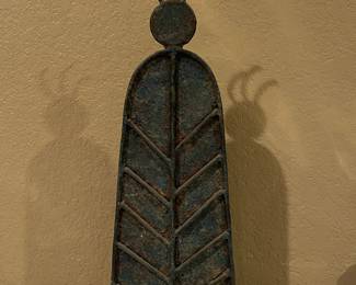 large metal shadow walker Native American sculpture