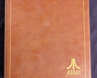 Atari binder with games