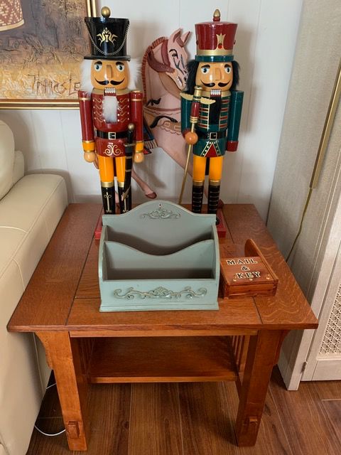 Nutcrackers, oak veneer end table, mail and key holders