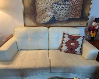 Small leather couch (68" long x 36" deep)