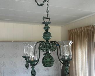 Dining chandelier (5-light) measures about 24" diameter by 24" high.  Antique oxidized copper (greenish) finish.