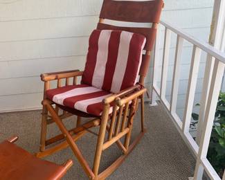 Rocking chair comes with cushions and leather head rest