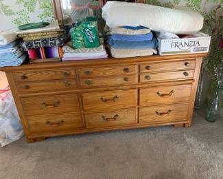 Tomasville oak dresser (68x19x32) and matching oak mirror (34x46)