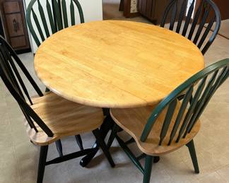 Round drop-leaf kitchen table with 4 chairs