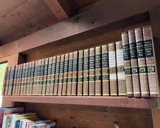 a set of encyclopedias and other random books.