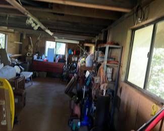 This is the workshop under the house that has lots of tools,  hardware, work benches & misc. handyman stuff!