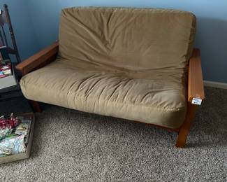 Futon (loveseat) extends to make a full size bed
