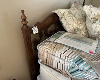 Queen bed frame with mattress and box spring