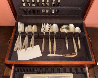 One of two sets of Sterling flatware that we will have.