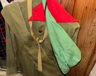 Although not all in this photo, we have a complete BoyScout uniform. Comes with shirt, pants, sash, 2 belts, scarf and the boot covers.