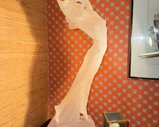 The beautiful frosted lucite art deco lady would look lovely anywhere you put her.